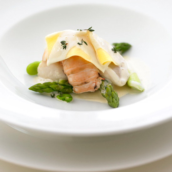 Open Saffron Ravioli, Scallop and Baby Lobster tail served with Thyme & Riesling jus